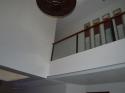 Glass Modern Stair Railing in Wrought Iron Frame